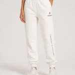 PROSIDZ women’s cream joggers with Pressure Is Privilege leg print, elastic waistband, side pockets, and cuffed ankles