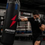 Athlete training with Prosidz punching bag in a professional gym environment