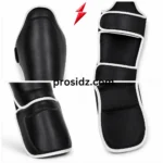 Muay Thai shin guards with extended black padded instep protection by PSI Prosidz Industries