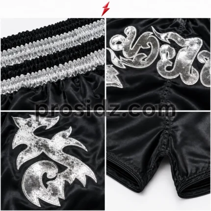 Private Label Muay Thai Shorts front view in black satin with silver artwork by PSI Prosidz Industries