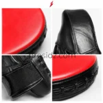 Prosidz Industries single red Wholesale punching pads image showing the oval striking surface, black border, and stitched edge.