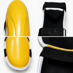 PSI black padded MMA shin guards rear view with elastic straps