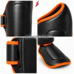 PSI Prosidz Industries Wholesale MMA Shin Guards detail showing bright orange piping, reinforced seams and strap construction