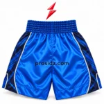 Rear-view mockup of PSI Blue Boxing Shorts by Prosidz Industries with a plain blue elastic waistband, navy graphic panels, silver piping and stitched hems.